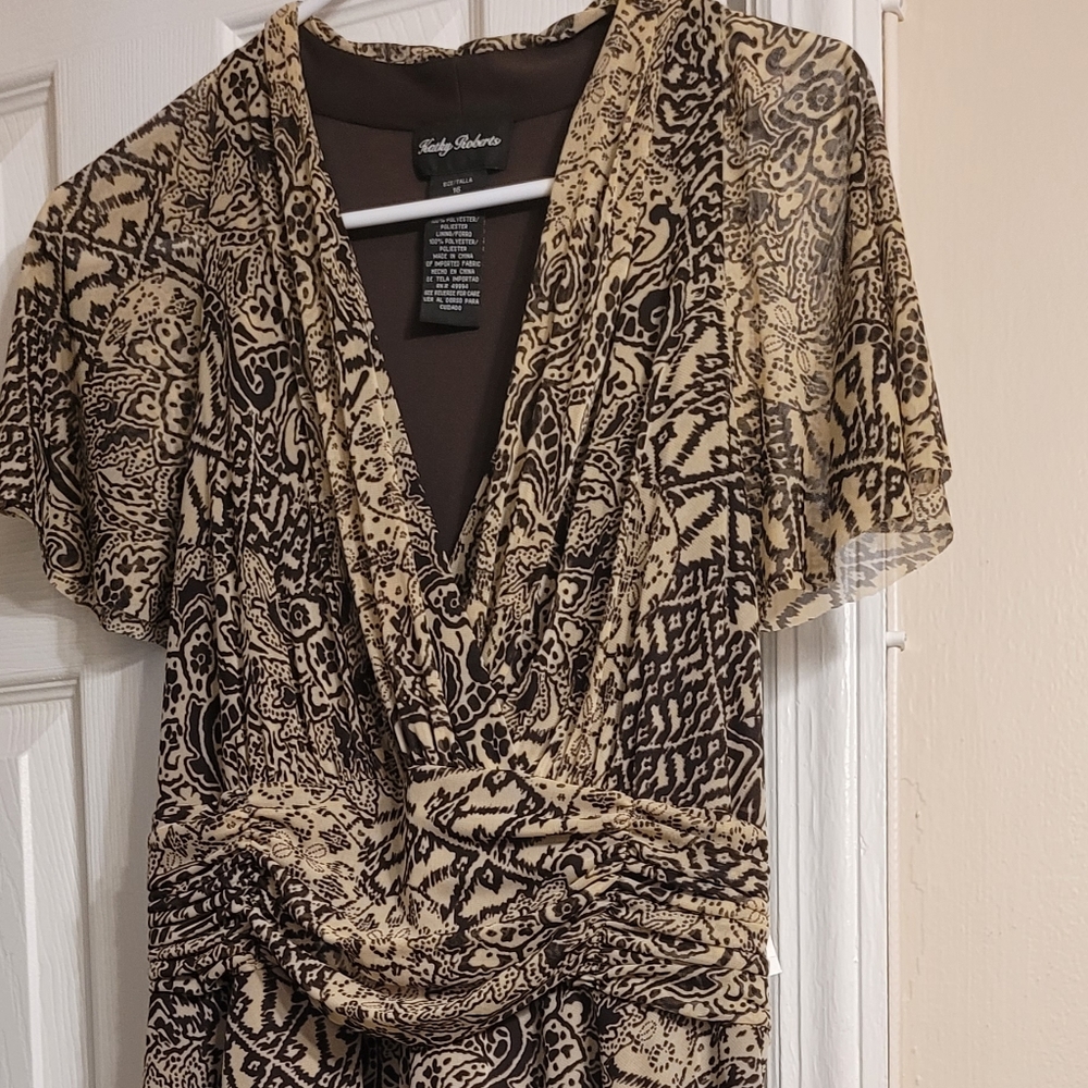 Lovely dress for casual or dressy occasions in neutral print